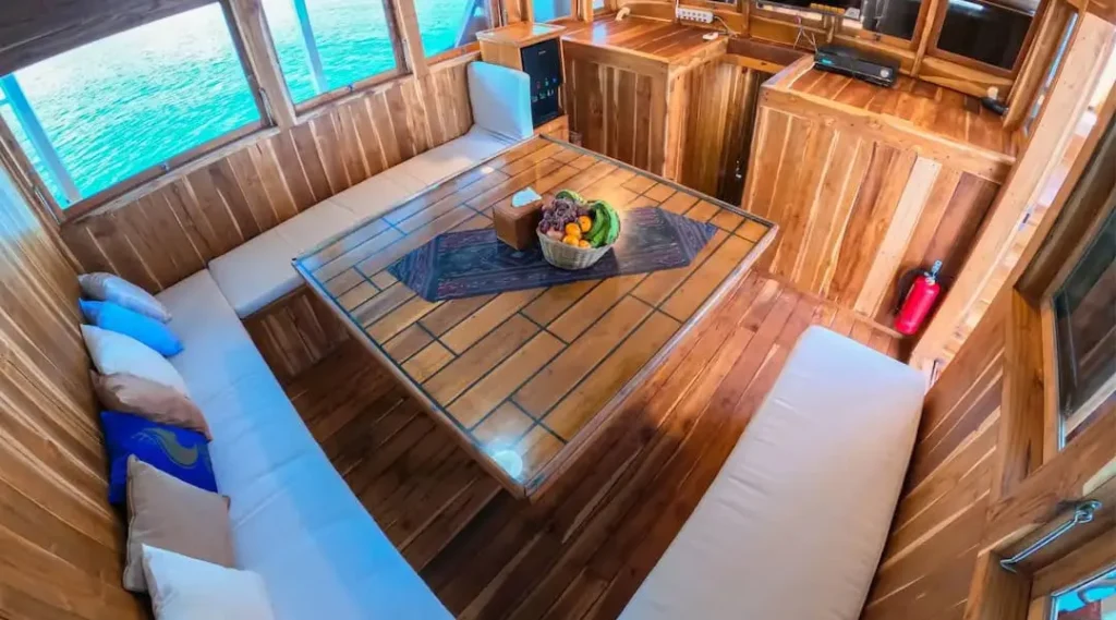 Malca Voyage Boat Charter | Malca Voyage Indoor Dining Area | Komodo Luxury