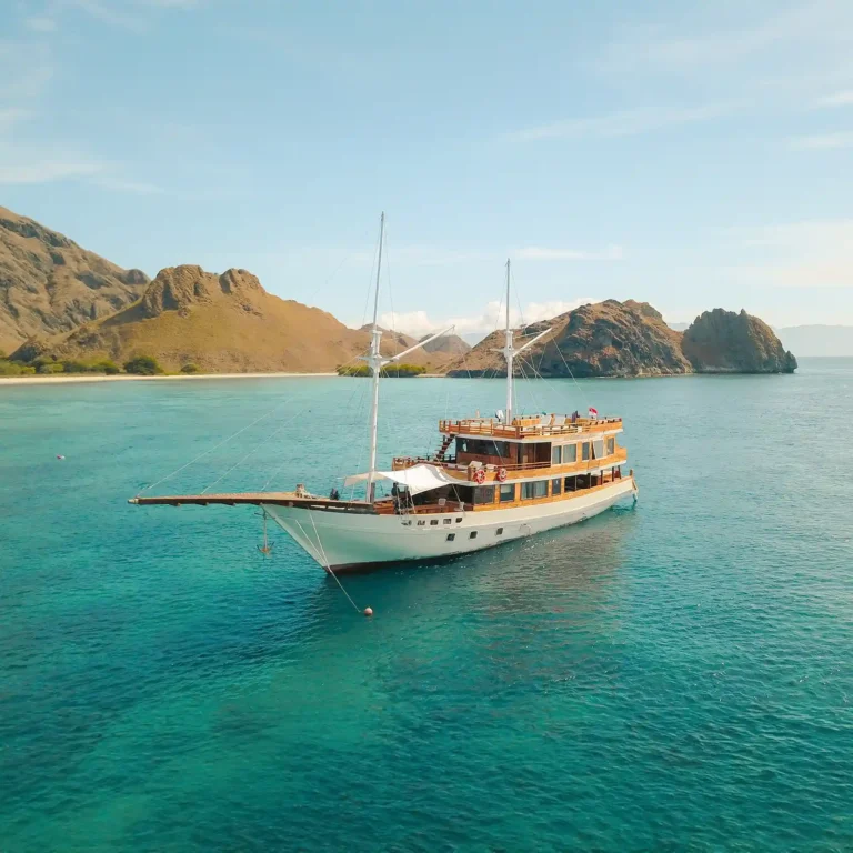 The Yumana phinisi anchored in a turquoise bay