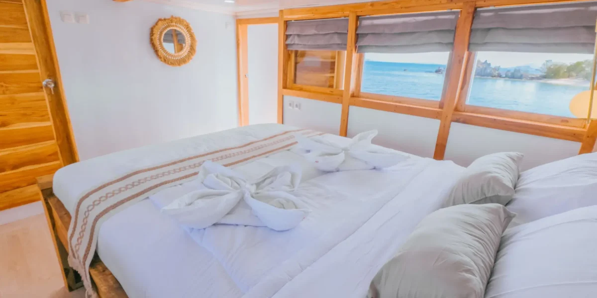 Bombana 2 Phinisi Cruise Boat Charter | Bombana 2 Private Balcony Room | Komodo Tour | Komodo Luxury