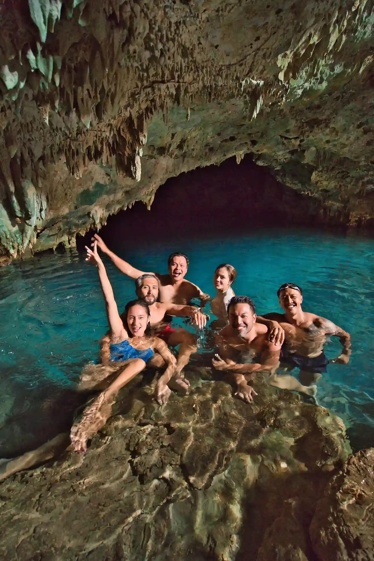 Turquoise saltwater pool inside Rangko Cave | Komodo Luxury