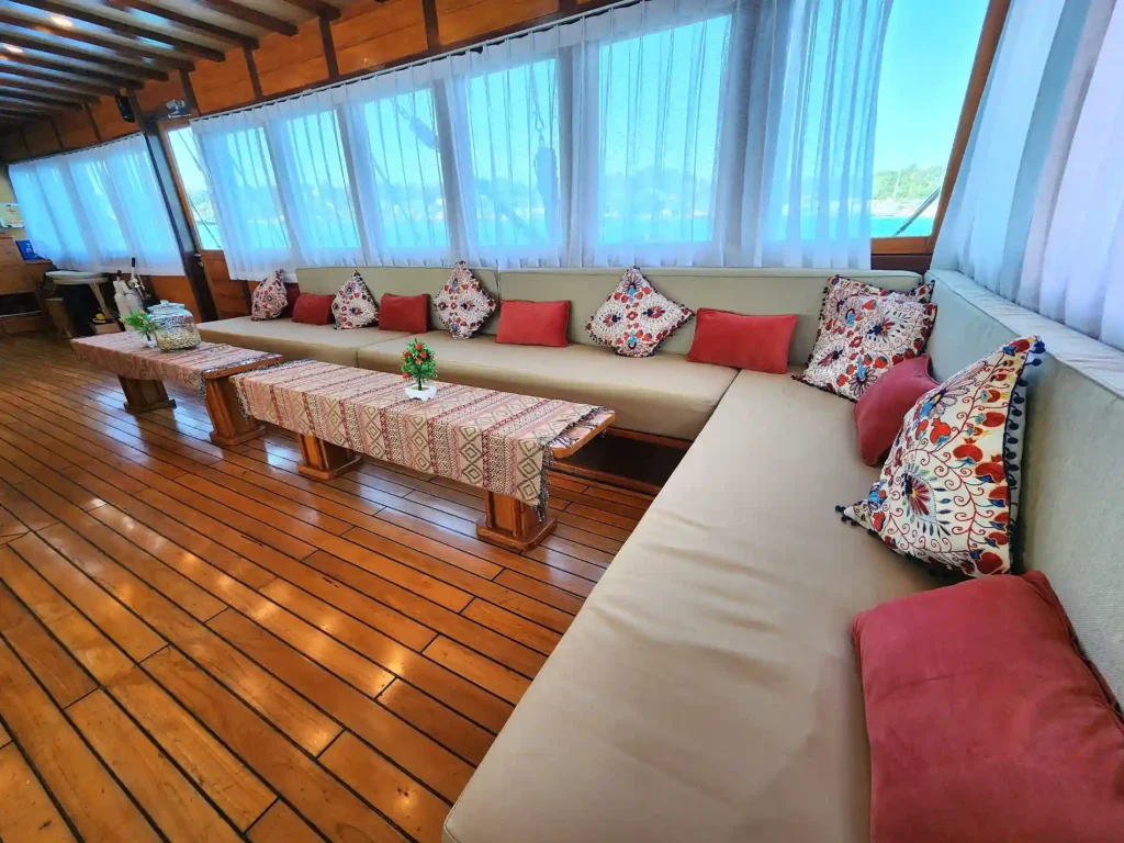 Indoor Lounge Area on Dancing Wind Phinisi Cruise | Komodo National Park | Komodo Luxury