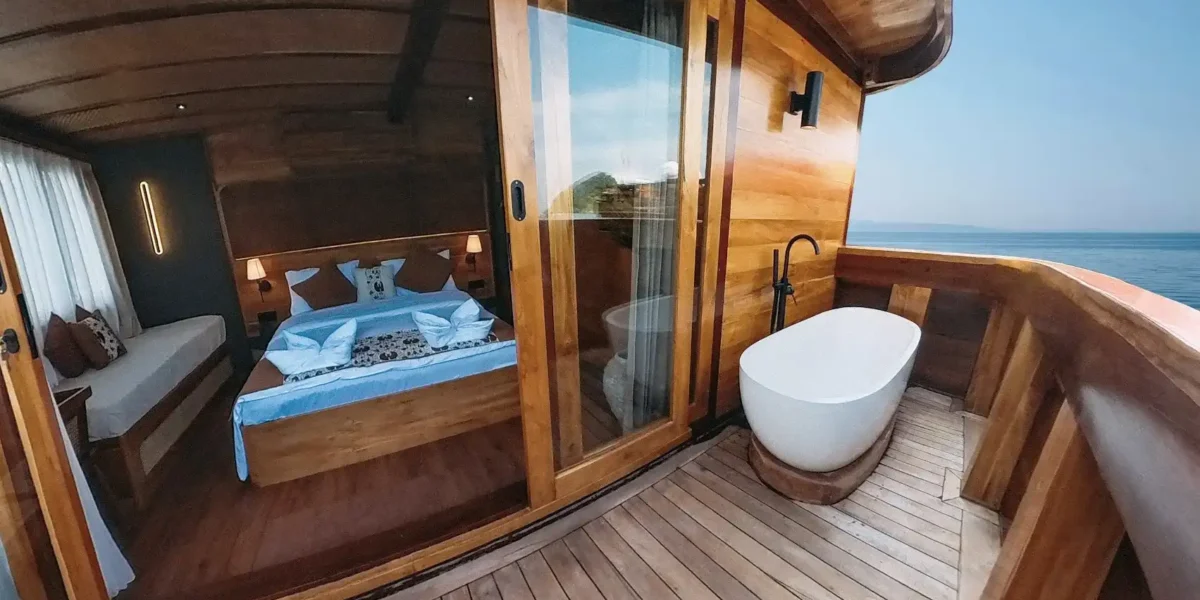 Angelica Liveaboard Phinisi Boat Charter | Candi Cabin Room Balcony | Komodo Luxury