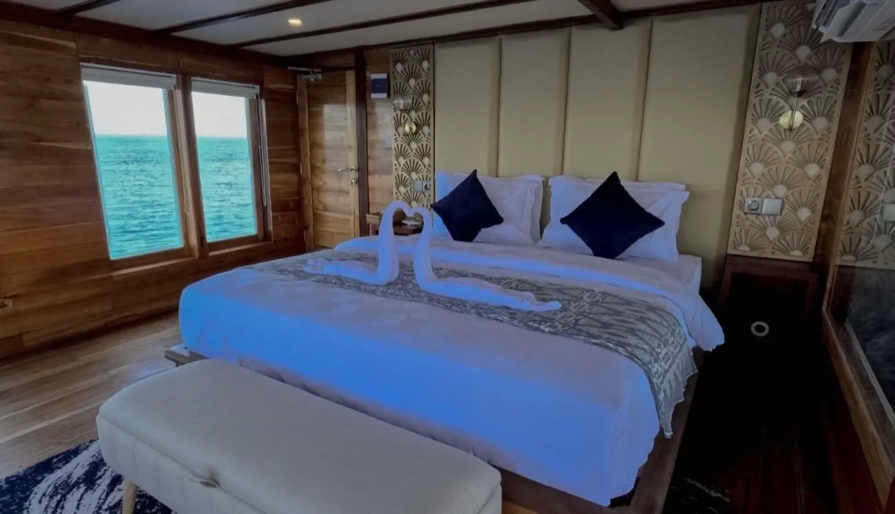 A double room aboard a charter phinisi