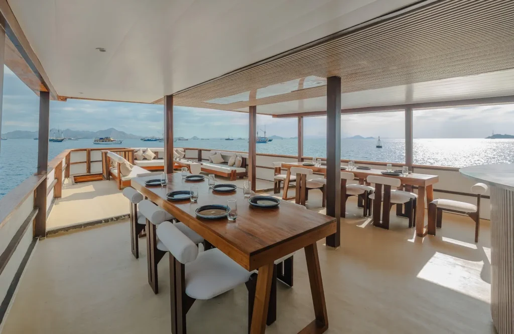 Sora Phinisi Boat Charter | Outdoor Dining Area Sora Phinisi | Komodo Luxury